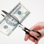 dollarcutinhalfwithscissors